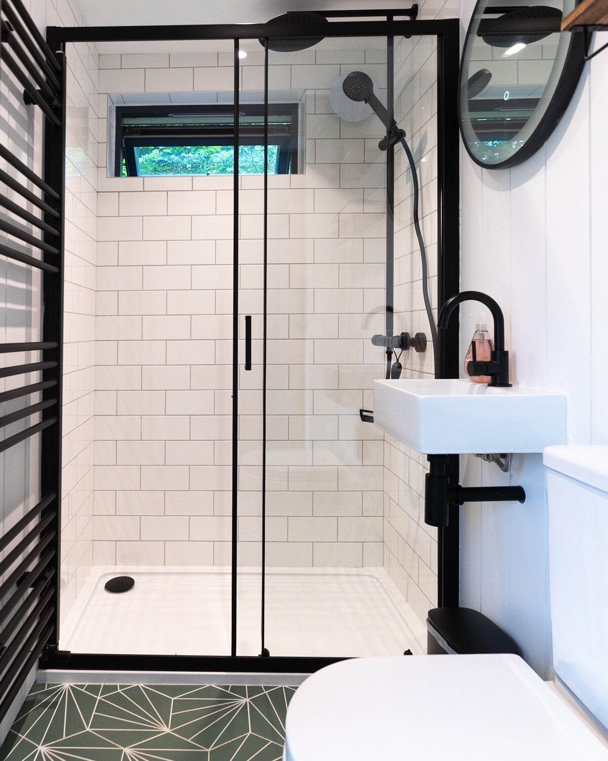 Shower room with Mandarin Stone Pod Green Tiles in this self contained holiday Dart cabin _ Life Space Cabins.JPG (1)