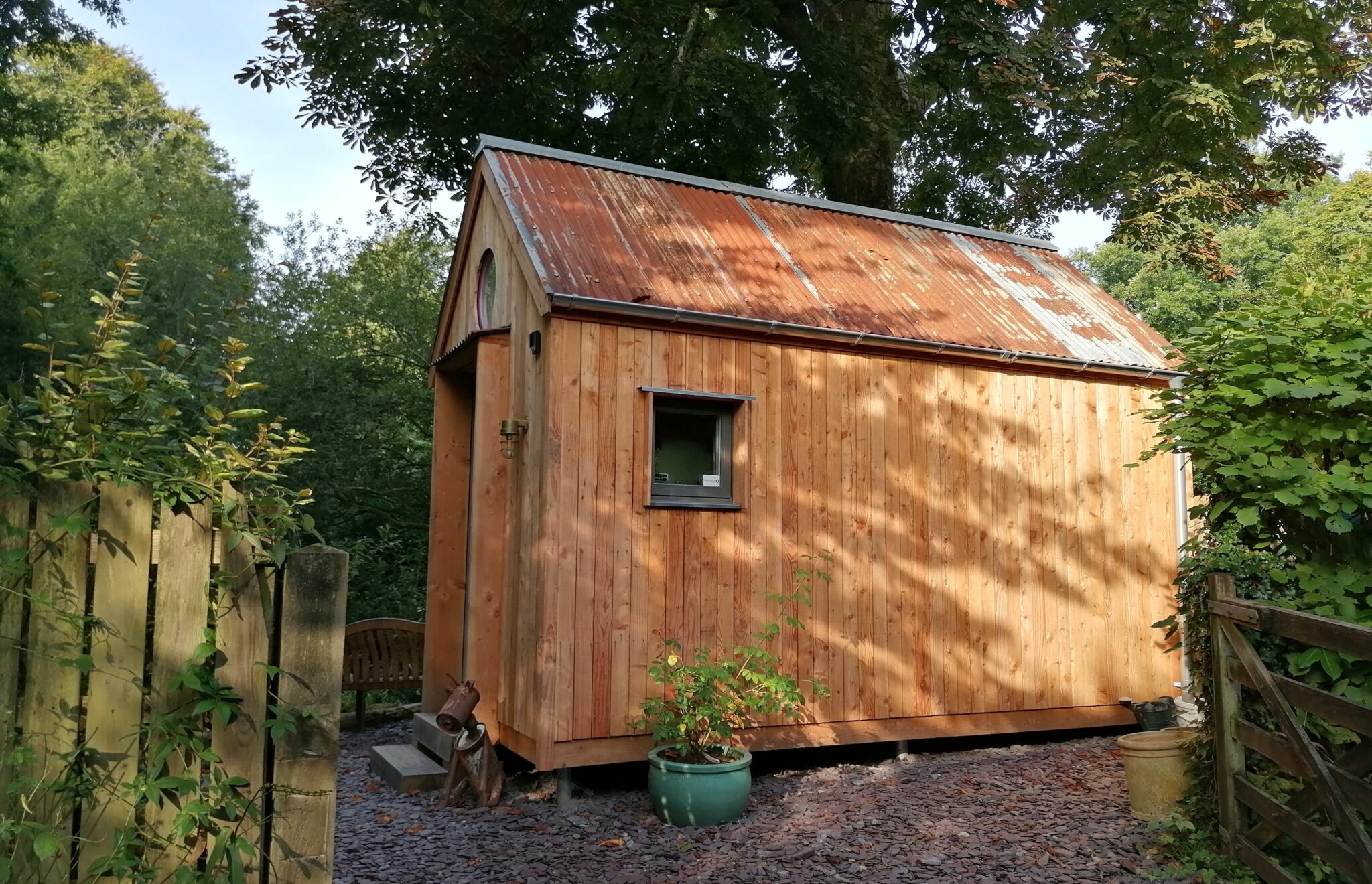Artist-Cabin-with-UK-larch-cladding-reclaimed-corrugated-tin-roof-and-galvinised-Lindab-guttering