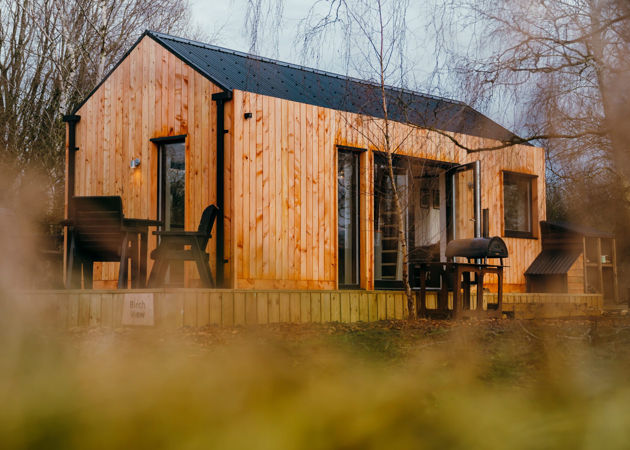 Tamar Cabin. An A frame roof with larch cladding and corrugated claco roof _ Life Space Cabins