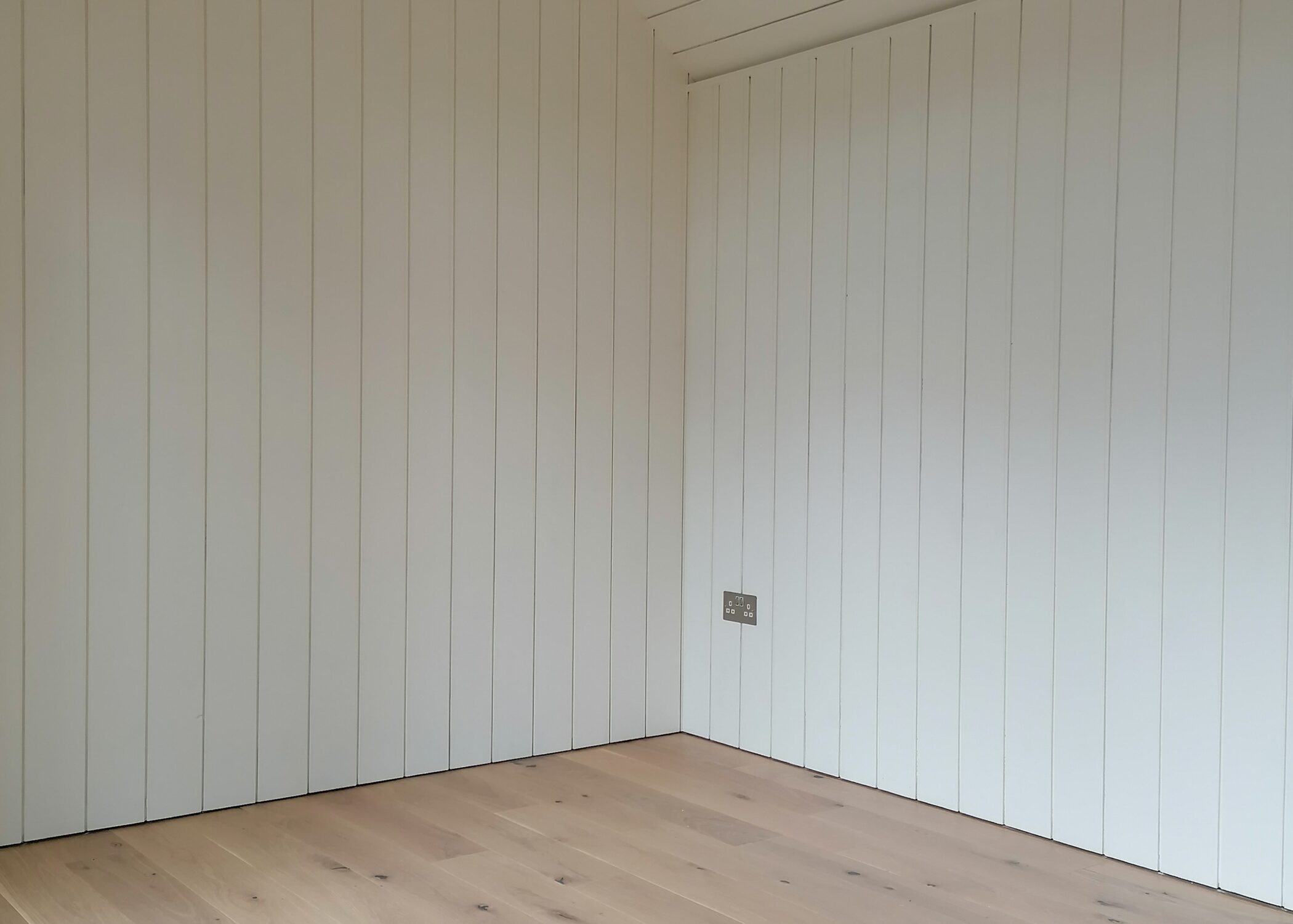 Tamar Cabin. A summerhouse cabin with engineered oak flooring and painted Farrow and Ball Wimborne White timber t&g cladding _Life Space Cabins.jpg (1)