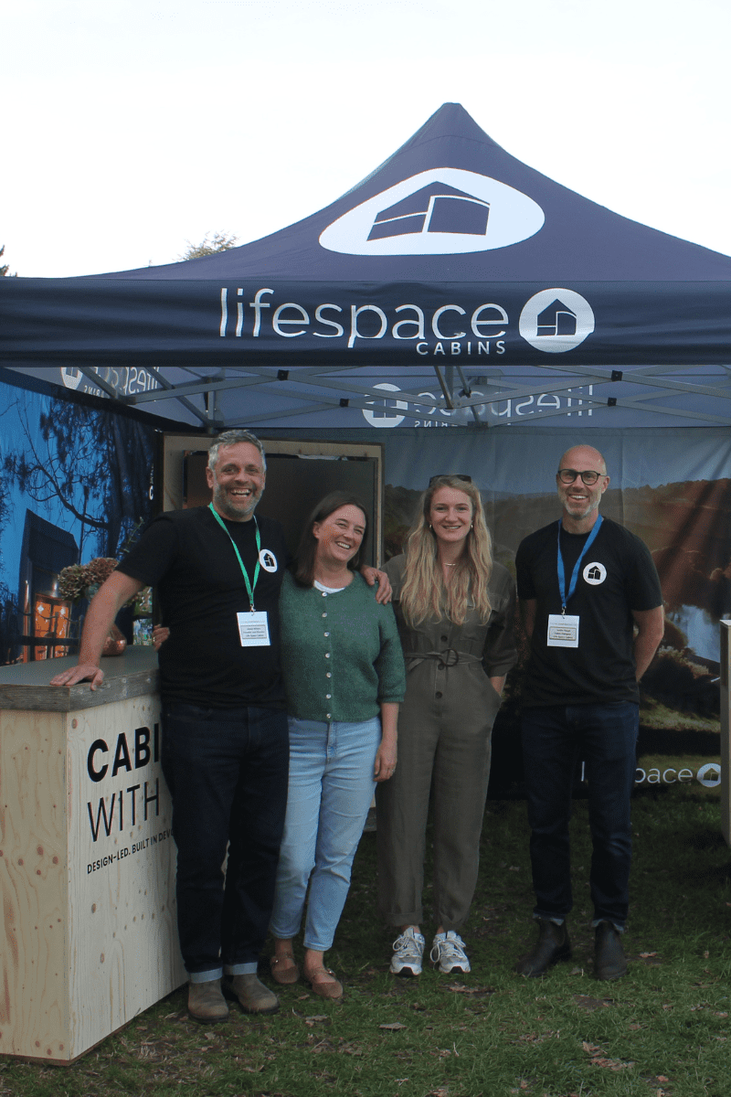 Life Space Cabins team exhibiting at the Glamping Show 2025